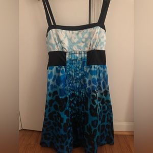 Size small Bebe black/blue/white satin dress in great condition